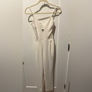 Express Cream Sleeveless V-Neck Jumpsuit With Pockets. Size Small, New With Tags
